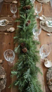 Use evergreen runners and woven linens