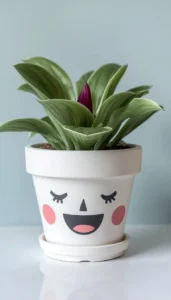Adorable Face Painted Pots for a Playful Look