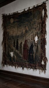 Threadbare Procession Wall Decor With a Story Missing Pieces